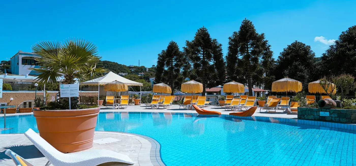 Swimming Pool and Sitting area view of Parco Delle Agavi Hotel Ichia, Italy